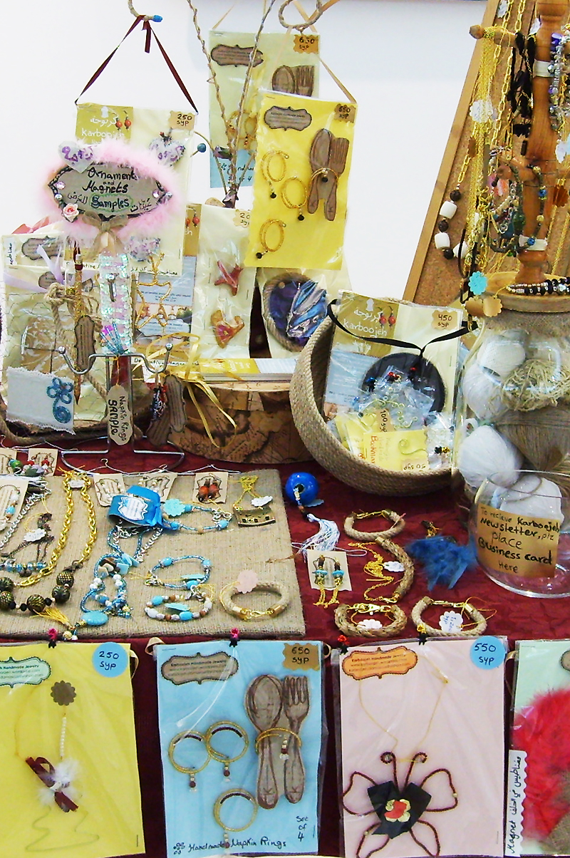 italian bazaar karboojeh craft show display table packaging burlap jewelry handmade